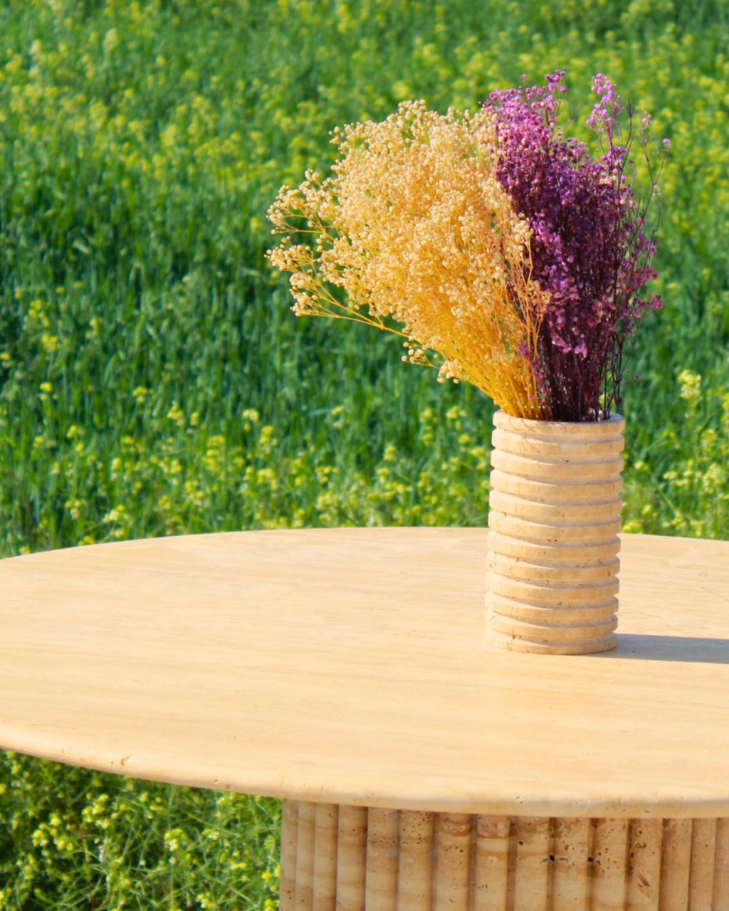 Handmade Travertine Round Dining Table: Fluted Base, Natural Stone